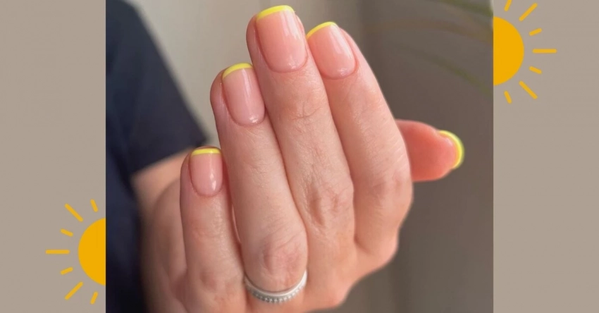 Трендовые идеи желтого французского маникюра на лето 2025 года